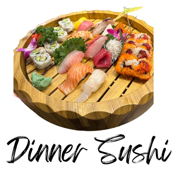 A large wooden platter filled with various sushi rolls, sashimi, and nigiri, garnished with wasabi and ginger.