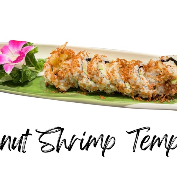 Koibito One Sushi & Teriyaki's Coconut Shrimp Tempura roll, garnished with a pink orchid and green leaf.