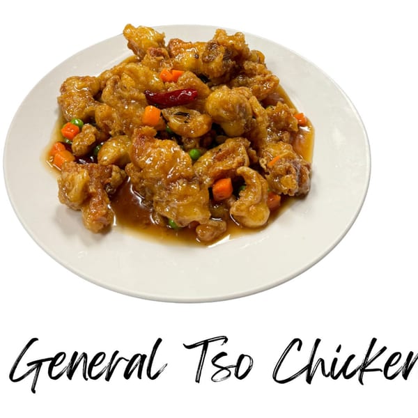 General Tso Chicken, a Japanese dish with crispy chicken, carrots, peas, and red chili in sauce.