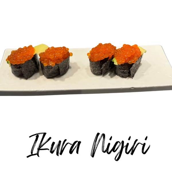Four pieces of Koibito One Sushi & Teriyaki's Ikura Nigiri, topped with bright orange salmon roe.