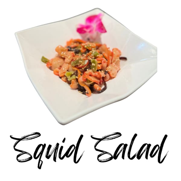 Koibito One Sushi & Teriyaki's Squid Salad, a Japanese dish with mixed vegetables and sesame seeds.