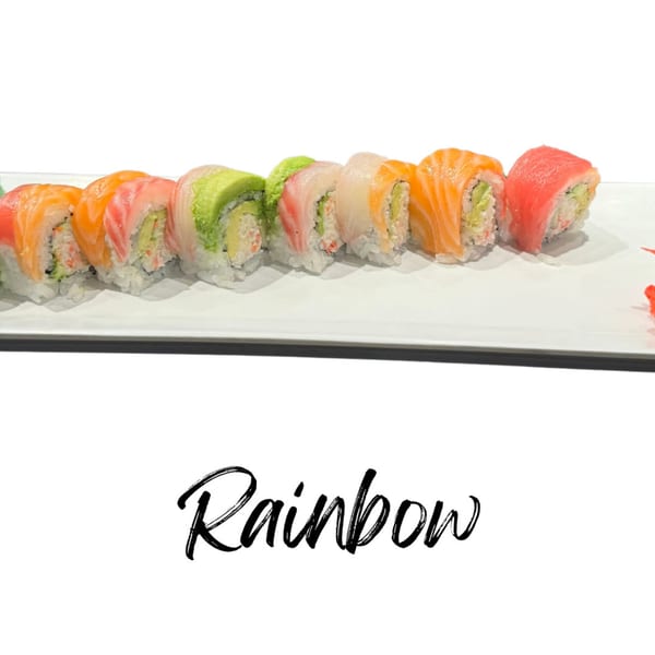 A row of colorful Rainbow sushi rolls with various fish toppings on a white plate.