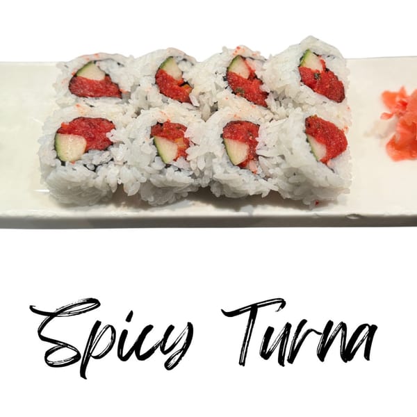 Eight pieces of Koibito One Sushi & Teriyaki spicy tuna roll with cucumber, served with ginger.