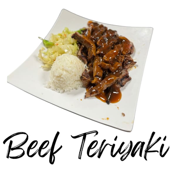 Koibito One Sushi & Teriyaki's beef teriyaki with rice and cabbage on a white plate.