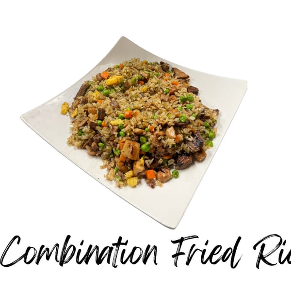 A square white plate filled with Koibito One's combination fried rice, featuring peas, carrots, and meat.