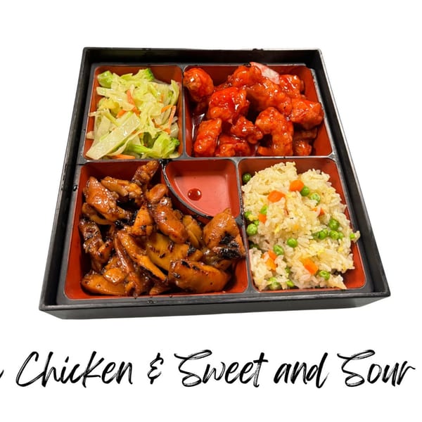 Koibito One Sushi & Teriyaki bento box with sweet and sour chicken, teriyaki chicken, fried rice, and salad.